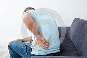 Mature Man Suffering From Back Pain