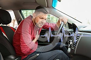 Mature man suffering from heart attack