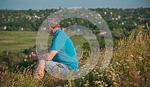 Mature man thinking about something, concept of age