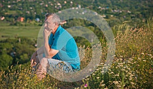 Mature man thinking about something, concept of age