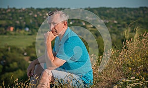 Mature man thinking about something, concept of age
