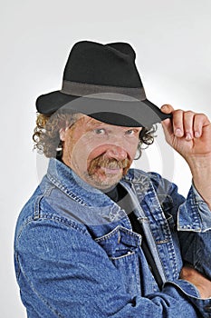 Mature man in trilby hat