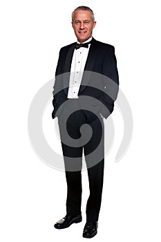 Mature man in tuxedo and black tie.