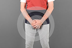 Mature man with urological problems suffering from pain