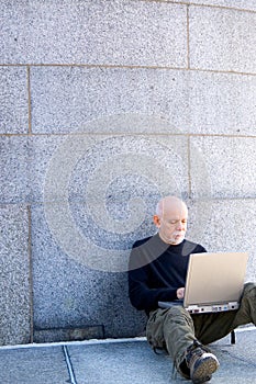 Mature man using a computer
