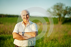 Mature man walking in a field