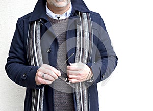 Mature Man Wearing A Navy Blue Winter Coat