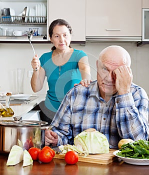 Mature married couple having quarrel