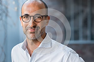 Mature mixed race man smiling