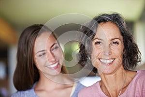 Mature mother, adult daughter and portrait with smile, love and bonding at home. Women, face and happiness with house