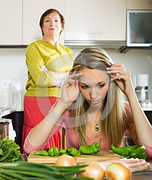 Mature mother and adult daughter after quarrel