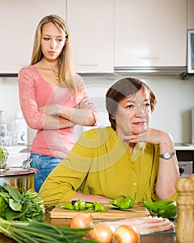 Mature mother against adult daughter after conflict