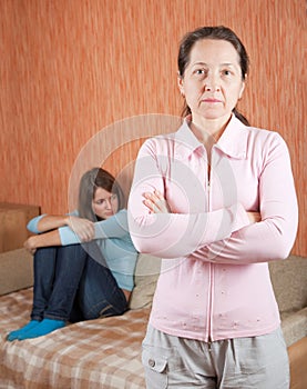 Mature mother and daughter having quarrel