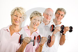 Mature older people lifting weights