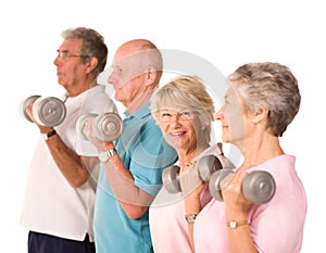 Mature older people lifting weights