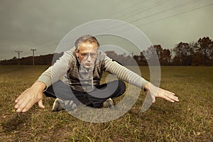 Mature older ugly man in glasses trying to be fitness icon