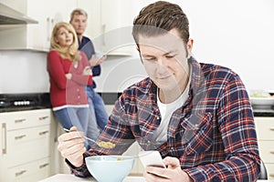 Mature Parents Frustrated With Adult Son Living At Home photo