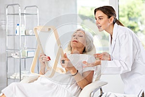 Mature patient with mirror