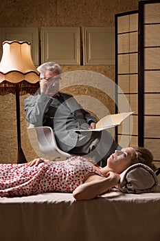 Mature psychoanalyst and female patient photo