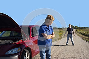 Mature Senior Woman Car Trouble, Danger Man Safety photo