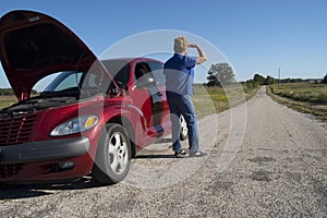 Mature Senior Woman Car Trouble, Road Breakdown photo