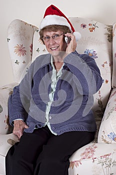 Mature Senior Woman Cell Phone Talk Christmas