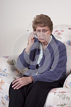 Mature Senior Woman Cell Phone Talking Concern Sad