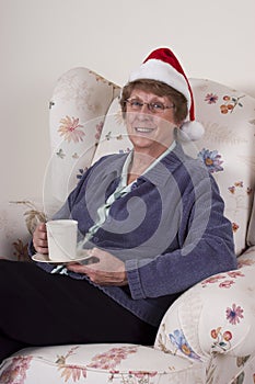 Mature Senior Woman Christmas Entertain Santa Hat