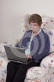 Mature Senior Woman Laptop Computer, Serious Look