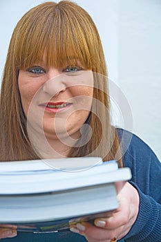 Mature student with books .