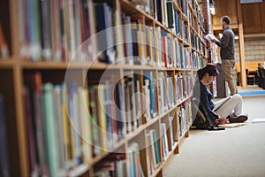 Mature student reading a book