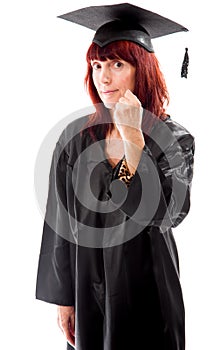 Mature student standing and showing her fist