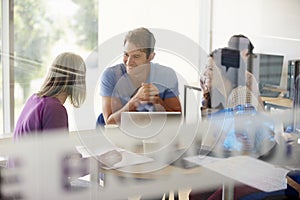 Mature Students Working In College Breakout Area