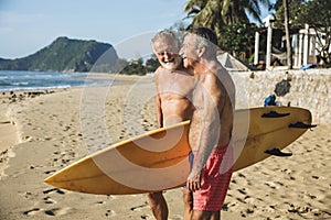 Mature surfers at the beach