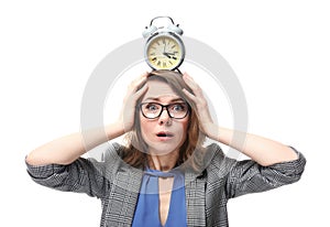 Mature woman with alarm clock on head against white background. Time management concept