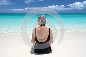 Mature woman on beach, turks and caicos