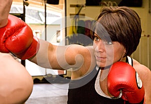 Mature Woman with Boxing Dummy