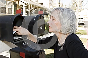 Mature Woman Checking Mailbox