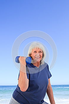 Mature woman doing her exercises