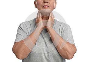Mature woman doing thyroid self examination on white background, closeup