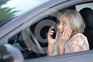 Mature woman driving a car