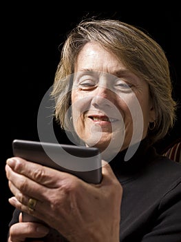 Mature Woman With E-Reader photo