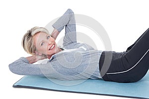 Mature woman exercising