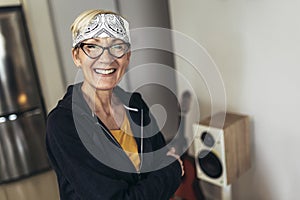 Mature woman with a gangster scarf around her head