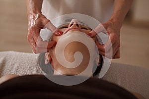 Mature woman getting massage at spa