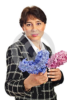 Mature woman holding hyacinth