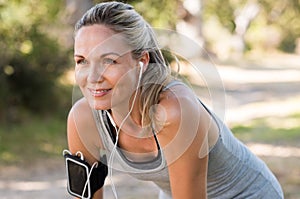 Mature woman jogging photo