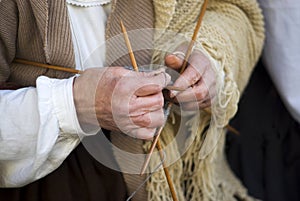 Mature woman knitting wool