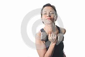 Mature woman lifting weights photo