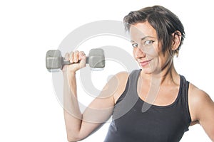 Mature woman lifting weights photo